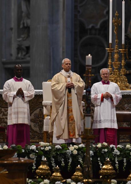 Pope Leo XIV (C) presides over the Holy Mass with Priestly Ordinations, at St Peter's Basilica in the Vatican on April 26, 2026. (Photo by Andreas SOLARO / AFP)