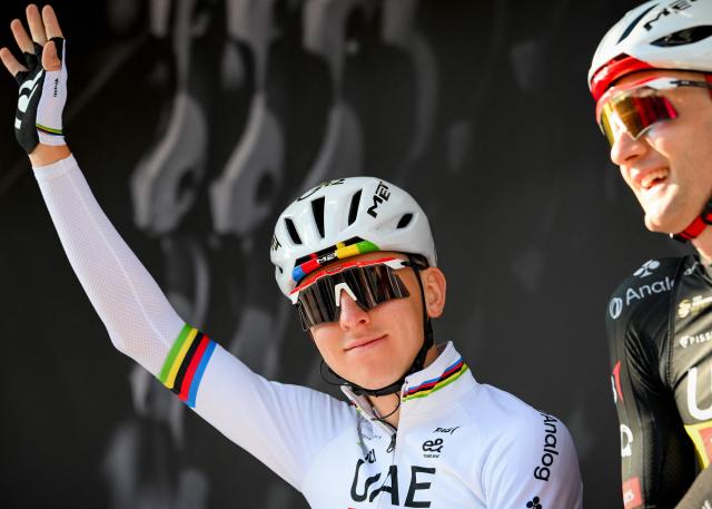 UAE Team Emirates-XRG's Slovenian rider Tadej Pogacar (C) gestures ahead of the start of the men elite race of the Liege-Bastogne-Liege UCI World Tour one day cycling race, 259,5km from Liege, over Bastogne to Liege, on April 26, 2026. (Photo by MAARTEN STRAETEMANS / Belga / AFP) / Belgium OUT