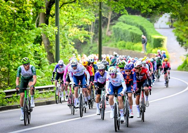 The pack of riders cycles during the men elite race of the Liege-Bastogne-Liege UCI World Tour one day cycling race, 259,5km from Liege, over Bastogne to Liege, on April 26, 2026. (Photo by MAARTEN STRAETEMANS / Belga / AFP) / Belgium OUT