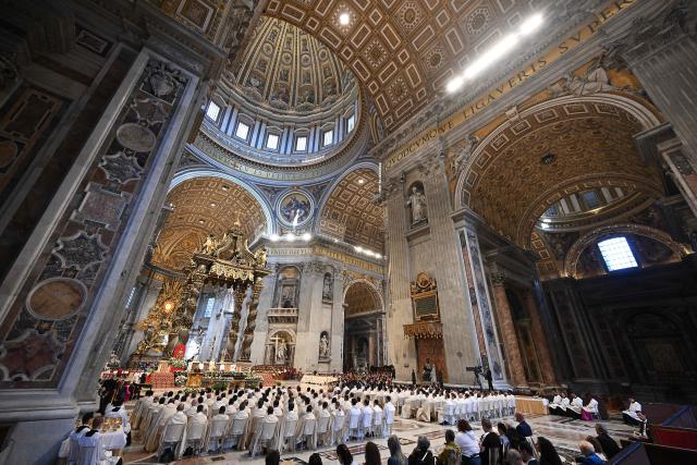 Pope Leo XIV (C) presides over the Holy Mass with Priestly Ordinations, at St Peter's Basilica in the Vatican on April 26, 2026. (Photo by Andreas SOLARO / AFP)