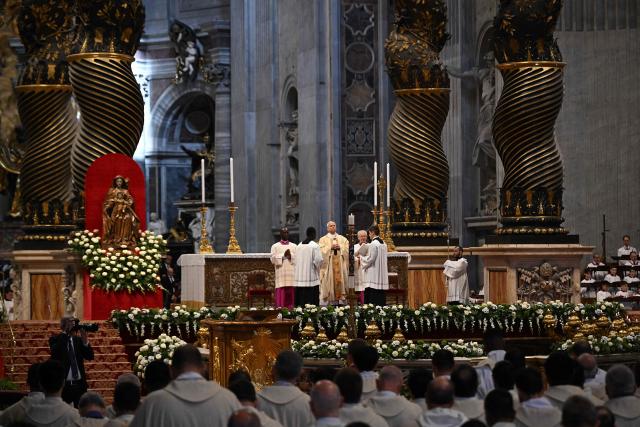 Pope Leo XIV (C) presides over the Holy Mass with Priestly Ordinations, at St Peter's Basilica in the Vatican on April 26, 2026. (Photo by Andreas SOLARO / AFP)