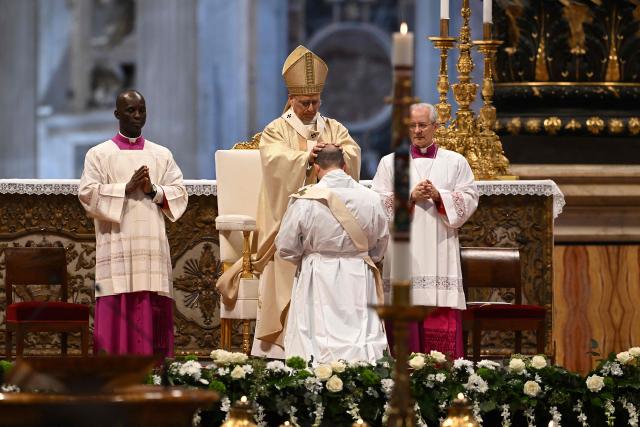 Pope Leo XIV (top C) presides over the Holy Mass with Priestly Ordinations, at St Peter's Basilica in the Vatican on April 26, 2026. (Photo by Andreas SOLARO / AFP)