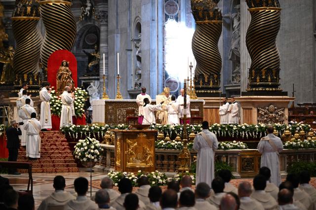 Pope Leo XIV (top C) presides over the Holy Mass with Priestly Ordinations, at St Peter's Basilica in the Vatican on April 26, 2026. (Photo by Andreas SOLARO / AFP)