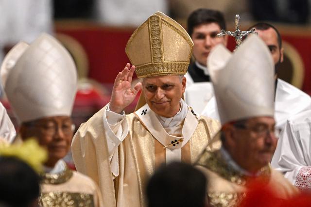Pope Leo XIV (C) reacts at the end of the Holy Mass with Priestly Ordinations, at St Peter's Basilica in the Vatican on April 26, 2026. (Photo by Andreas SOLARO / AFP)