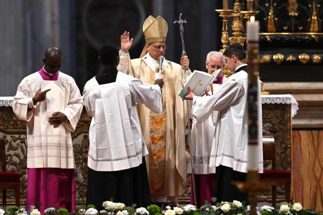 Pope Leo XIV (top C) presides over the Holy Mass with Priestly Ordinations, at St Peter's Basilica in the Vatican on April 26, 2026. (Photo by Andreas SOLARO / AFP)