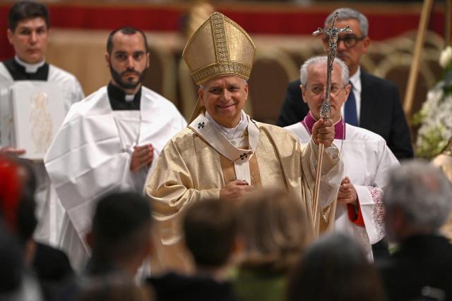 Pope Leo XIV (C) reacts at the end of the Holy Mass with Priestly Ordinations, at St Peter's Basilica in the Vatican on April 26, 2026. (Photo by Andreas SOLARO / AFP)