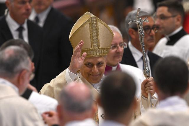 Pope Leo XIV (C) waves at the end of the Holy Mass with Priestly Ordinations, at St Peter's Basilica in the Vatican on April 26, 2026. (Photo by Andreas SOLARO / AFP)