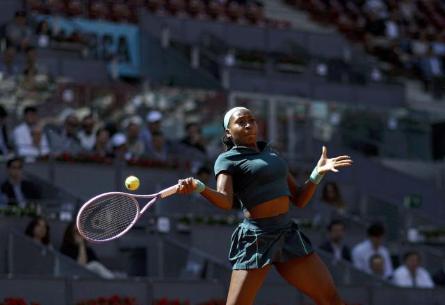 US Coco Gauff returns the ball to Romania's Sorana Cirstea during their 2026 WTA Tour Madrid Open tennis tournament singles match at the Caja Magica in Madrid, on April 26, 2026. (Photo by OSCAR DEL POZO / AFP)