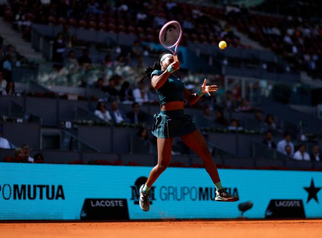US Coco Gauff returns the ball to Romania's Sorana Cirstea during their 2026 WTA Tour Madrid Open tennis tournament singles match at the Caja Magica in Madrid, on April 26, 2026. (Photo by OSCAR DEL POZO / AFP)