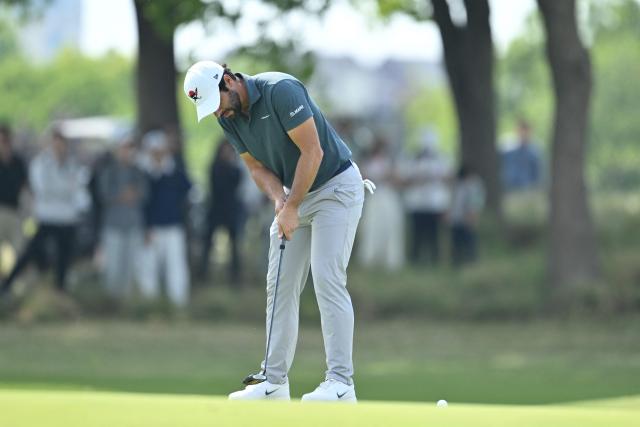 Adrian Otaegui of the United Arab Emirates putts during the final round of the China Open golf tournament in Shanghai on April 26, 2026. (Photo by CN-STR / AFP) / China OUT