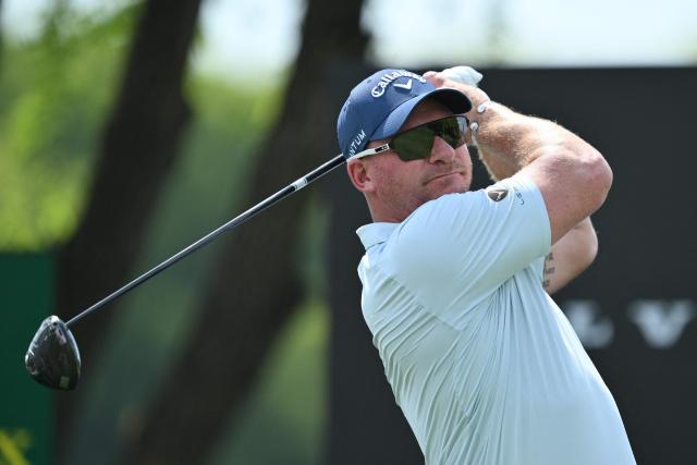 South Africa's Shaun Norris hits a shot during the final round of the China Open golf tournament in Shanghai on April 26, 2026. (Photo by CN-STR / AFP) / China OUT