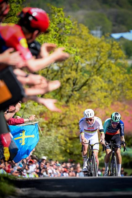 Decathlon CMA-CGM Team's French rider Paul Seixas (R) and UAE Team Emirates-XRG's Slovenian rider Tadej Pogacar cycle during the men elite race of the Liege-Bastogne-Liege UCI World Tour one day cycling race, 259,5km from Liege, over Bastogne to Liege, on April 26, 2026. (Photo by MAARTEN STRAETEMANS / Belga / AFP) / Belgium OUT