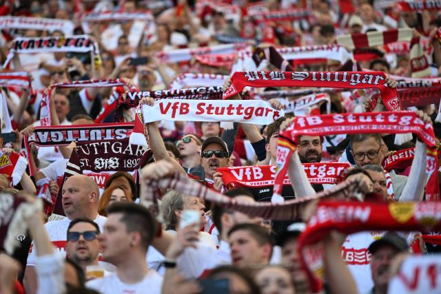 VfB Stuttgart's fans cheer their team prior the German first division Bundesliga football match between VfB Stuttgart and SV Werder Bremen in Stuttgart, southwestern Germany on April 26, 2026. (Photo by THOMAS KIENZLE / AFP) / DFL REGULATIONS PROHIBIT ANY USE OF PHOTOGRAPHS AS IMAGE SEQUENCES AND/OR QUASI-VIDEO