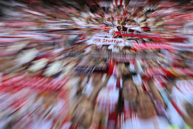 VfB Stuttgart's fans cheer their team prior the German first division Bundesliga football match between VfB Stuttgart and SV Werder Bremen in Stuttgart, southwestern Germany on April 26, 2026. (Photo by THOMAS KIENZLE / AFP) / DFL REGULATIONS PROHIBIT ANY USE OF PHOTOGRAPHS AS IMAGE SEQUENCES AND/OR QUASI-VIDEO