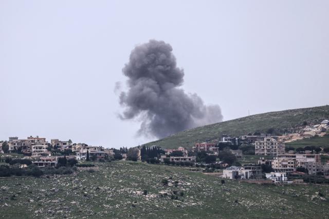 Smoke rises following an airstrike from targeted areas in Kfar Tibnit, in southern Lebanon's Nabatieh province on April 26, 2026. Lebanon was drawn into the Middle East war on March 2 when Tehran-backed militant group Hezbollah launched attacks on Israel to avenge the killing of the Iranian leader. Israel has responded with broad strikes across Lebanon and a ground offensive. (Photo by AFP)