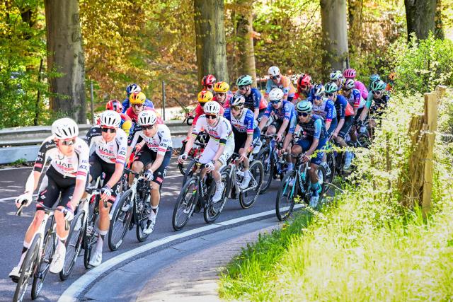 UAE Team Emirates-XRG's Slovenian rider Tadej Pogacar (C) cycles during the men elite race of the Liege-Bastogne-Liege UCI World Tour one day cycling race, 259,5km from Liege, over Bastogne to Liege, on April 26, 2026. (Photo by MAARTEN STRAETEMANS / Belga / AFP) / Belgium OUT