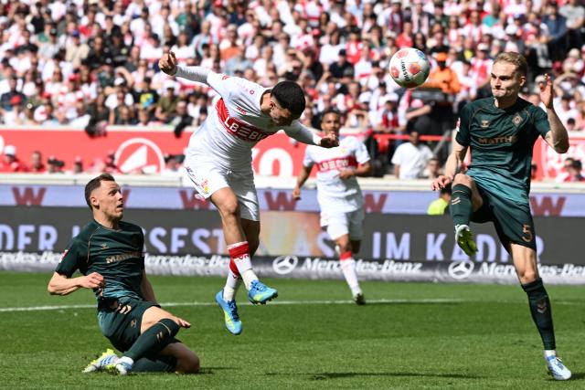 Stuttgart's German-Marrocan forward #11 Bilal El Khannouss heads the ball but fails to score during the German first division Bundesliga football match between VfB Stuttgart and SV Werder Bremen in Stuttgart, southwestern Germany on April 26, 2026. (Photo by THOMAS KIENZLE / AFP) / DFL REGULATIONS PROHIBIT ANY USE OF PHOTOGRAPHS AS IMAGE SEQUENCES AND/OR QUASI-VIDEO
