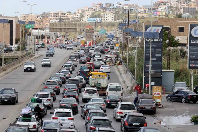 Vehicles clog the highway as civilians flee their homes and head north toward the Lebanese capital, hours after a military escalation that included Israeli airstrikes targeting the south, on April 26, 2026. Hezbollah rejected Israel's prime minister's accusation that it was jeopardising a ceasefire and said it would continue responding to Israel's violations and its occupation of south Lebanon on April 26. Lebanon was drawn into the Middle East war on March 2, 2026, when the Tehran-backed militant group Hezbollah launched attacks on Israel to avenge the killing of the Iranian leader. Israel has responded with broad strikes across Lebanon and a ground offensive. (Photo by MAHMOUD ZAYYAT / AFP)