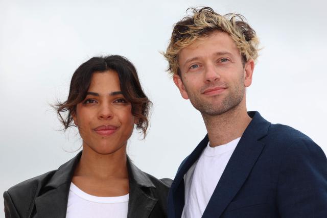 French actor Xavier Lacaille (R) and French actress Zita Hanrot (L) pose during the "Paradoxes" photocall as part of the 9th edition of the Cannes international Series Festival (Canneseries) in Cannes, southern France, on April 26, 2026. (Photo by Valery HACHE / AFP)