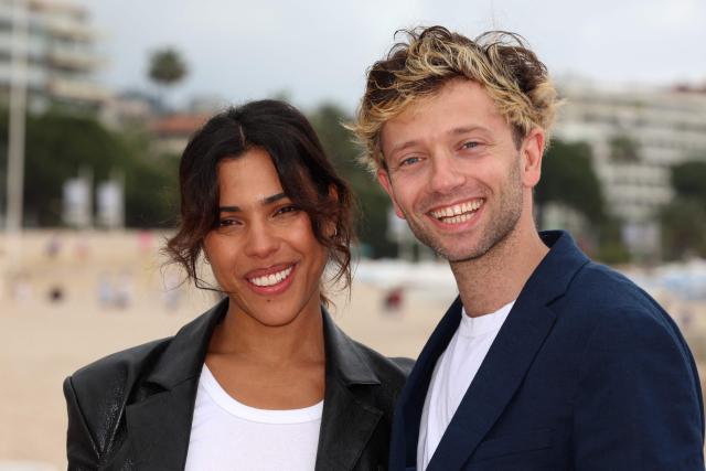 French actor Xavier Lacaille (R) and French actress Zita Hanrot (L) pose during the "Paradoxes" photocall as part of the 9th edition of the Cannes international Series Festival (Canneseries) in Cannes, southern France, on April 26, 2026. (Photo by Valery HACHE / AFP)
