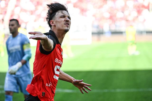 Rennes' French forward #09 Esteban Lepaul celebrates scoring his team's first goal during the French L1 football match between Stade Rennais FC and FC Nantes at the Roazhon Park stadium in Rennes on April 26, 2026. (Photo by Sebastien Salom-Gomis / AFP)
