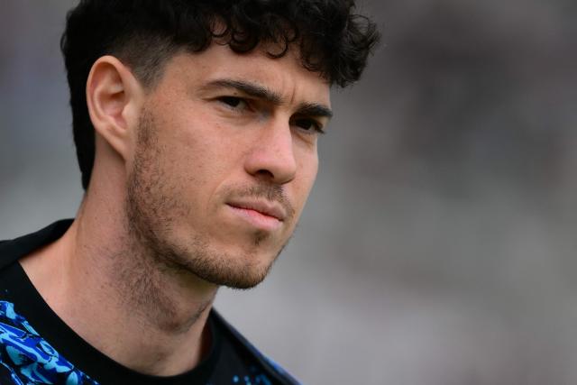 Inter Milan's Italian defender #95 Alessandro Bastoni looks on during the warm up ahead of the Italian Serie A football match between Torino and Inter Milan at the Olympic Stadium Grande Torino in Turin on April 26, 2026. (Photo by MARCO BERTORELLO / AFP)