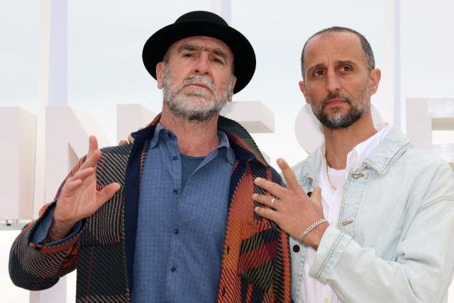French actor and former football player Eric Cantona (L) and French actor Arie Elmaleh pose during the "Brigade Anonyme" photocall as part of the 9th edition of the Cannes international Series Festival (Canneseries) in Cannes, southern France, on April 26, 2026. (Photo by Valery HACHE / AFP)