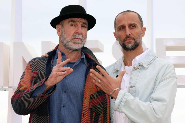 French actor and former football player Eric Cantona (L) and French actor Arie Elmaleh pose during the "Brigade Anonyme" photocall as part of the 9th edition of the Cannes international Series Festival (Canneseries) in Cannes, southern France, on April 26, 2026. (Photo by Valery HACHE / AFP)