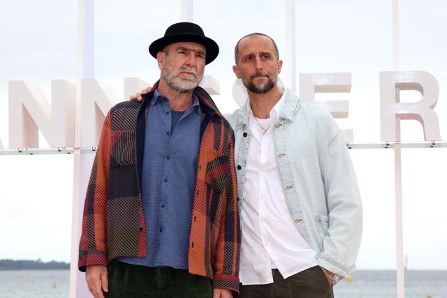 French actor and former football player Eric Cantona (L) and French actor Arie Elmaleh pose during the "Brigade Anonyme" photocall as part of the 9th edition of the Cannes international Series Festival (Canneseries) in Cannes, southern France, on April 26, 2026. (Photo by Valery HACHE / AFP)
