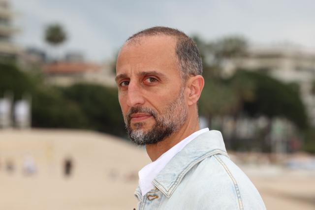 French actor Arie Elmaleh pose during the "Brigade Anonyme" photocall as part of the 9th edition of the Cannes international Series Festival (Canneseries) in Cannes, southern France, on April 26, 2026. (Photo by Valery HACHE / AFP)