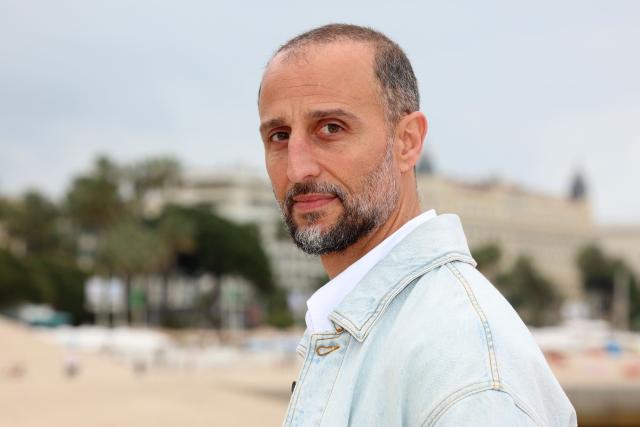 French actor Arie Elmaleh pose during the "Brigade Anonyme" photocall as part of the 9th edition of the Cannes international Series Festival (Canneseries) in Cannes, southern France, on April 26, 2026. (Photo by Valery HACHE / AFP)