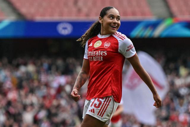 Arsenal's Canadian midfielder #15 Olivia Smith celebrates after scoring her team's second goal during the women's UEFA Champions League first-leg semi-final football match between Arsenal and OL Lyonnes at the Emirates Stadium, north London, on April 26, 2026. (Photo by Glyn KIRK / AFP)