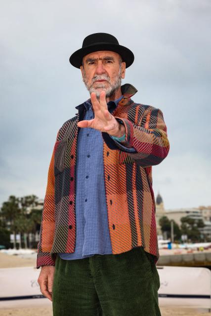 French actor and former football player Eric Cantona  poses during the "Brigade Anonyme" photocall as part of the 9th edition of the Cannes international Series Festival (Canneseries) in Cannes, southern France, on April 26, 2026. (Photo by Valery HACHE / AFP)