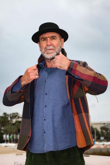 French actor and former football player Eric Cantona  poses during the "Brigade Anonyme" photocall as part of the 9th edition of the Cannes international Series Festival (Canneseries) in Cannes, southern France, on April 26, 2026. (Photo by Valery HACHE / AFP)