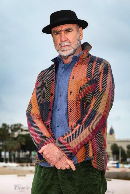 French actor and former football player Eric Cantona  poses during the "Brigade Anonyme" photocall as part of the 9th edition of the Cannes international Series Festival (Canneseries) in Cannes, southern France, on April 26, 2026. (Photo by Valery HACHE / AFP)