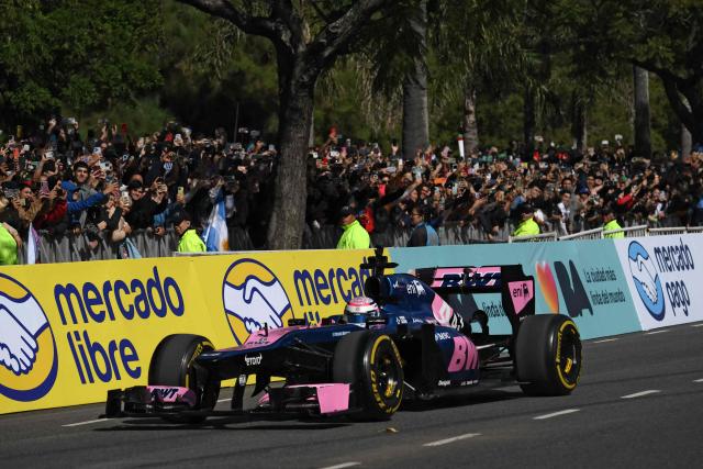 Argentina's Formula One driver Franco Colapinto onboard an Alpine Lotus E20 performs during an exhibition in Buenos Aires on April 26, 2026, ahead of the Miami Grand Prix. (Photo by Luis ROBAYO / AFP)