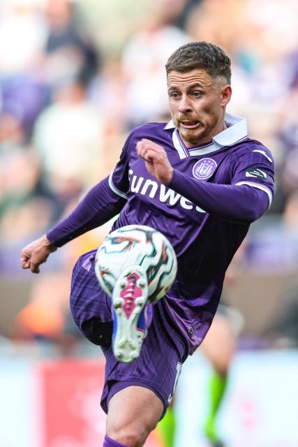 RSC Anderlecht's Belgian midfielder #11 Thorgan Hazard kicks the ball during the Belgian "Pro League" Champions' play-off (day 5 out of 10) football match between RSCA Anderlecht and Royale Union Saint-Gilloise at at the Lotto Park stadium in Brussels on April 26, 2026. (Photo by BRUNO FAHY / Belga / AFP) / Belgium OUT