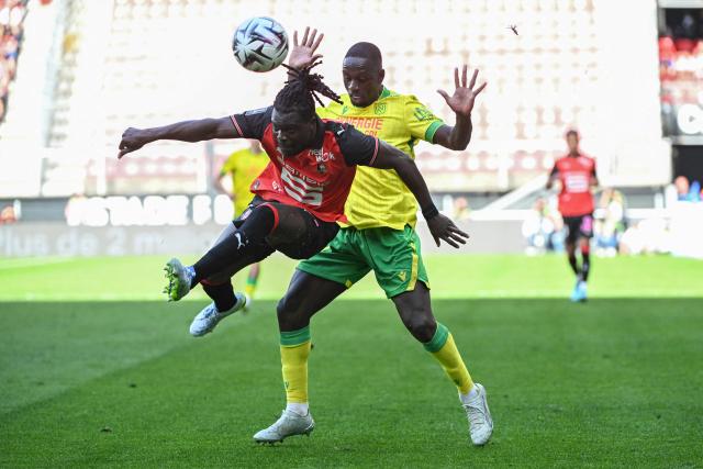 Rennes' Ghanaian defender #36 Alidu Seidu (L) fights for the ball with Nantes' Colombian defender #27 Deiver Machado during the French L1 football match between Stade Rennais FC and FC Nantes at the Roazhon Park stadium in Rennes on April 26, 2026. (Photo by Sebastien Salom-Gomis / AFP)
