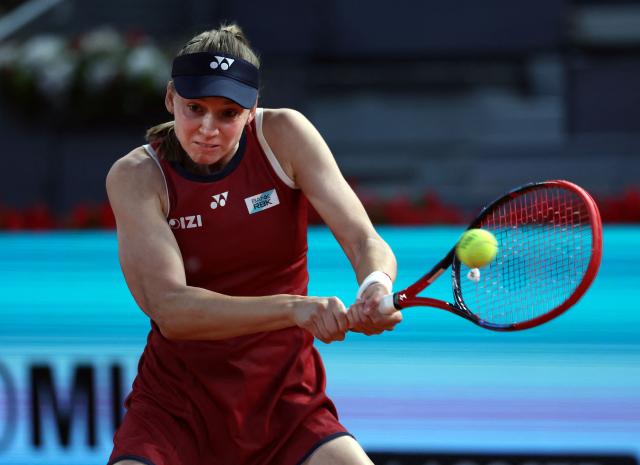Kazakhstan's Elena Rybakina returns the ball to China's Zheng Qinwen during their 2026 WTA Tour Madrid Open tennis tournament third round singles match at the Caja Magica in Madrid, on April 26, 2026. (Photo by Thomas COEX / AFP)