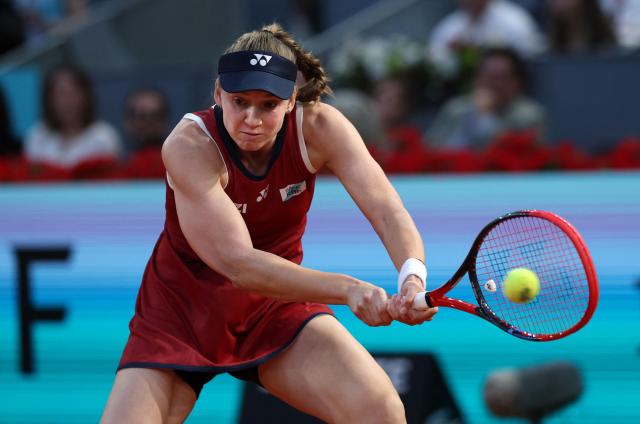 Kazakhstan's Elena Rybakina returns the ball to China's Zheng Qinwen during their 2026 WTA Tour Madrid Open tennis tournament third round singles match at the Caja Magica in Madrid, on April 26, 2026. (Photo by Thomas COEX / AFP)