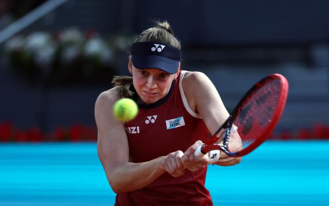 Kazakhstan's Elena Rybakina returns the ball to China's Zheng Qinwen during their 2026 WTA Tour Madrid Open tennis tournament third round singles match at the Caja Magica in Madrid, on April 26, 2026. (Photo by Thomas COEX / AFP)