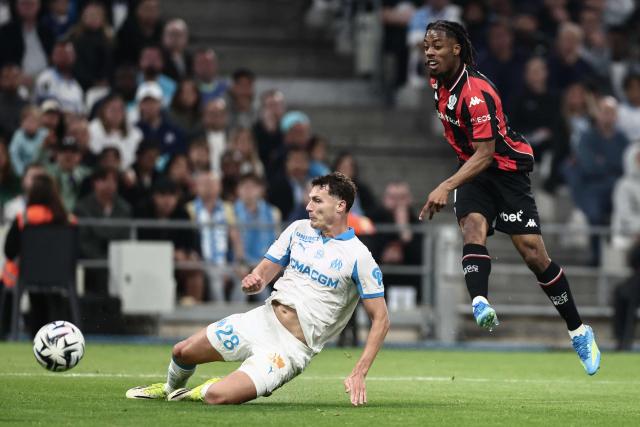 Nice’s French forward #11 Elye Wahi (R) shoots towards goal during the French Ligue 1 football match between Olympique de Marseille (OM) and OGC Nice at the Velodrome stadium in Marseille, south-eastern France on April 26, 2026. (Photo by Thibaud MORITZ / AFP)