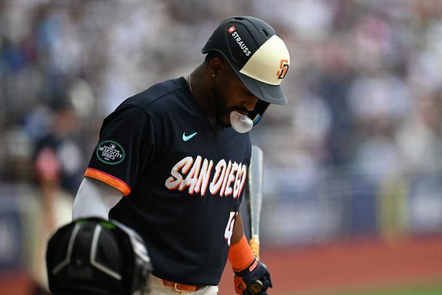 San Diego Padres' #41 Miguel Andujar blows a bubble with chewing gum as he steps up to bat during the MLB World Tour Mexico City Series game between the Arizona Diamondbacks and the San Diego Padres at Alfredo Harp Helu Stadium in Mexico City on April 26, 2026. (Photo by YURI CORTEZ / AFP)