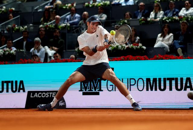 Spain's Rafael Jodar returns the ball to Brazil's Joao Fonseca during their 2026 ATP Tour Madrid Open tennis tournament third round singles match at the Caja Magica in Madrid, on April 26, 2026. (Photo by Thomas COEX / AFP)
