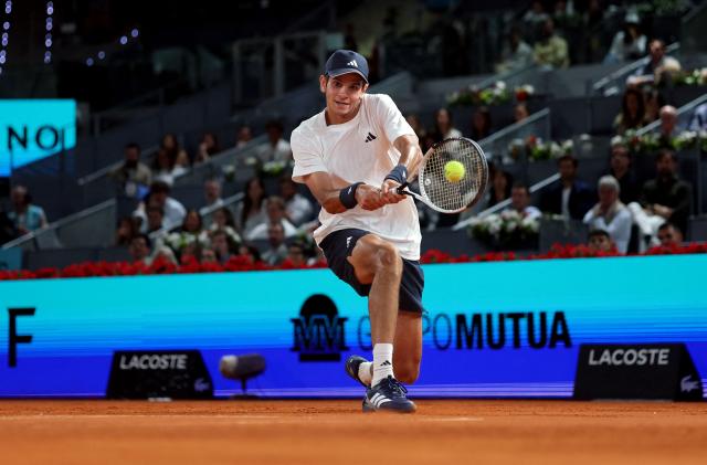 Spain's Rafael Jodar returns the ball to Brazil's Joao Fonseca during their 2026 ATP Tour Madrid Open tennis tournament third round singles match at the Caja Magica in Madrid, on April 26, 2026. (Photo by Thomas COEX / AFP)
