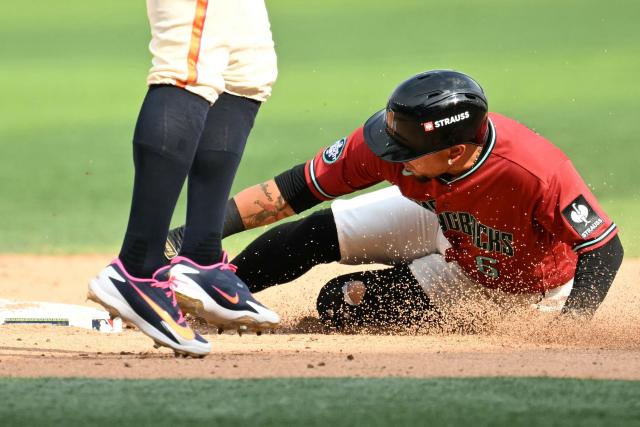 Arizona Diamondbacks' #06 Ildemaro Vargas slides into second base past San Diego Padres' #02 Xander Bogaerts during the MLB World Tour Mexico City Series game between the Arizona Diamondbacks and the San Diego Padres at Alfredo Harp Helu Stadium in Mexico City on April 26, 2026. (Photo by YURI CORTEZ / AFP)