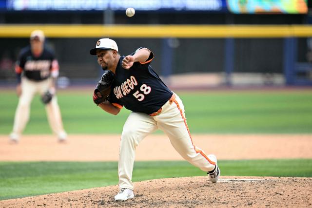 San Diego Padres' #58 Wandy Peralta pitches during the MLB World Tour Mexico City Series game between the Arizona Diamondbacks and the San Diego Padres at Alfredo Harp Helu Stadium in Mexico City on April 26, 2026. (Photo by YURI CORTEZ / AFP)