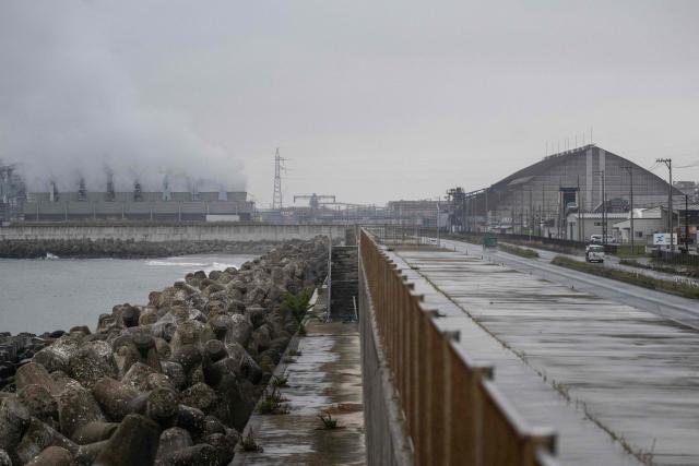Steam rises out of a power station protected by a tsunami sea wall in Ishinomaki, Miyagi Prefecture on April 27, 2026. A strong earthquake rattled Japan's northern island of Hokkaido early on April 27, US and Japanese meteorological agencies reported, the latest in a series of powerful tremors to hit the island nation. (Photo by ANDREW CABALLERO-REYNOLDS / AFP)