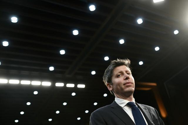 (FILES) Open AI CEO Sam Altman arrives for a US Senate Commerce Committee hearing on artificial intelligence (AI) on Capitol Hill in Washington, DC, on May 8, 2025. Elon Musk's lawsuit accusing high-profile artificial intelligence company OpenAI of betraying its non-profit mission heads for trial on April 27, 2026 with the selection of jurors. The legal clash in a courtroom across the bay from San Francisco pits the world's richest person against a startup Musk once backed and now competes with in the booming AI sector. (Photo by Brendan SMIALOWSKI / AFP)