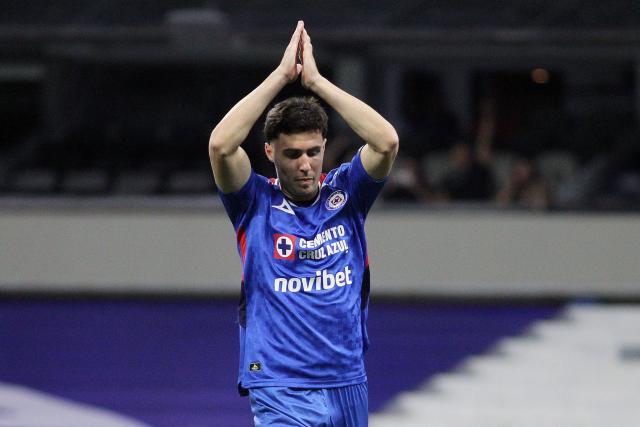 Cruz Azul's Argentine forward #20 Jose Paradela reacts after scoring the opening goal during the Liga MX Clausura football match between Cruz Azul and Necaxa at Banorte Stadium in Mexico City on April 26, 2026. (Photo by Victor Cruz / AFP)